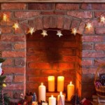 christmas decorations inside fireplace